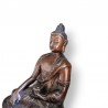 Très joli statue de Bouddha avec une teinte foncée