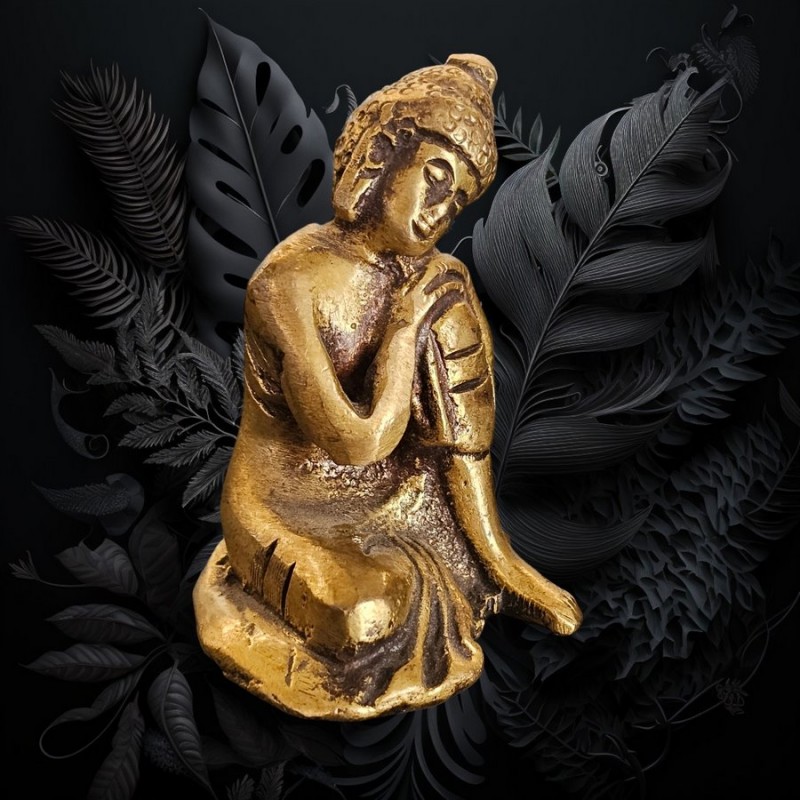 Petite statuette de bouddha en laiton au repos